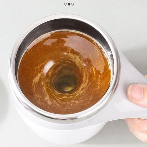 Self Stirring Coffee Mug in use